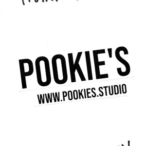May include: A white background with handwritten text that says "THANK YOU!" in black ink. Below is a black and white logo that says "POOKIE'S" and "WWW.POOKIES.STUDIO". At the bottom is the signature "xx HILARY".