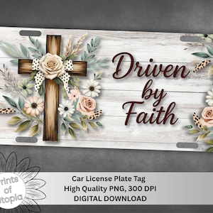 May include: A car license plate tag with a wooden cross adorned with a cream-colored rose and a polka-dot bow. The words "Driven by Faith" are written in a brown script. Floral accents and a wood-grain background complete the design.