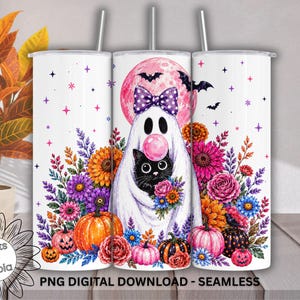 May include: A cylindrical tumbler featuring a white background with a ghost wearing a purple polka dot bow and blowing a pink bubble, holding a black cat. The design includes a pink moon, bats, colorful flowers, and orange and pink pumpkins.