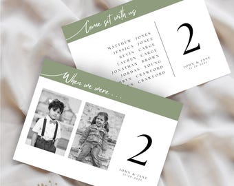 Puede incluir: Dos tarjetas de mesa de boda con fondo blanco y borde verde salvia. Una tarjeta dice "Come sit with us" y enumera nombres. La otra tarjeta tiene dos fotos en blanco y negro y el texto "When we were..." Ambas tarjetas tienen un gran número "2".