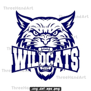 May include: A navy blue graphic of a snarling wildcat head with the word "WILDCATS" in bold, white letters across its mouth. The image has sharp lines and a fierce expression, suitable for sports team merchandise.