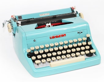 Turquoise Typewriter Royal Quiet DeLuxe Manual with Case Working Typewriter With Booklet and Key and New Ribbon