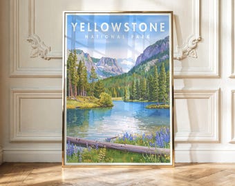 May include: A framed vertical art print featuring a landscape illustration of Yellowstone National Park. The scene depicts a blue lake, green pine trees, and rocky mountains under a clear sky. The text YELLOWSTONE NATIONAL PARK is at the top.