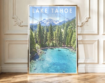 May include: A vertical wall art print in a gold frame featuring a landscape of Lake Tahoe, California. The image displays a clear turquoise lake in the foreground, a dense forest of green pine trees in the middle, and snow-capped mountains.