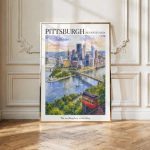 May include: A vertical art print featuring a watercolor painting of the Pittsburgh, Pennsylvania skyline. The scene includes the city buildings, a yellow bridge, a river, and a red incline car in the foreground. Text reads PITTSBURGH PENNSYLVANIA.