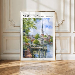 May include: A vertical art print featuring a watercolor painting of a waterfront scene in New Bern, North Carolina. The image displays a tall church steeple, historic brick buildings, lush green trees, a black lamppost, and a wooden pier.