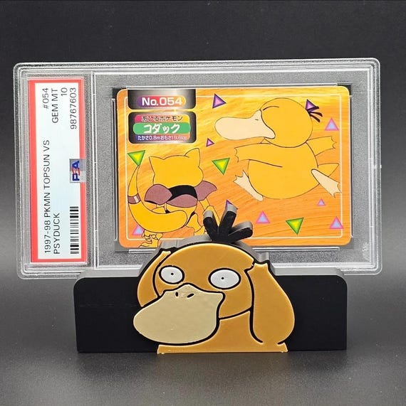 psyduck graded card Pokemon Graded: Psyduck 1st Edition 79/105 Neo Destiny (2000) Common CGC 8.5