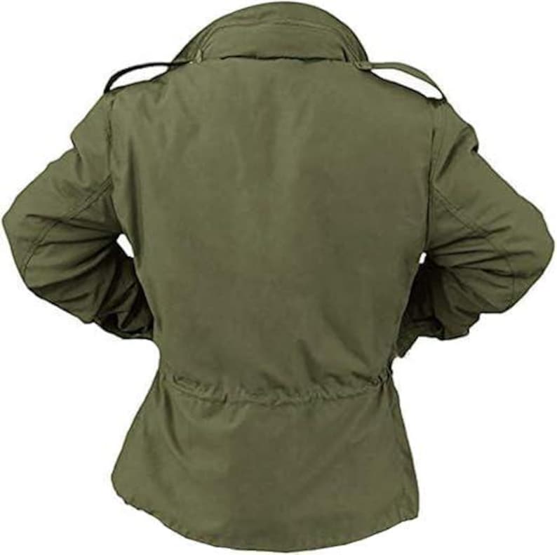 May include: Olive green military-style jacket. The jacket features a collar, shoulder epaulets, and a drawstring waist. The sleeves are long, and the jacket appears to be made of a durable fabric. The back view of the jacket is shown.
