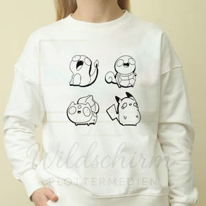 May include: White sweatshirt featuring four black and white cartoon character illustrations. The sweatshirt has a crew neck and long sleeves. The text "Wildschirm PLOTTERMEDIEN" is visible at the bottom of the image.