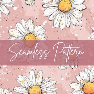 May include: Seamless pattern featuring white daisies with yellow centers on a pink background. The design includes a watercolor effect with white speckles and the words "Seamless Pattern" in a cursive font.