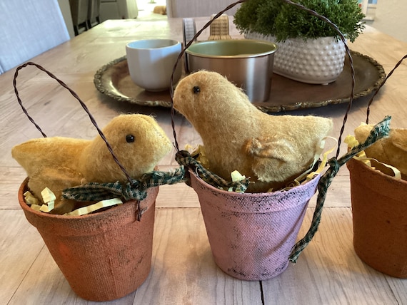 Yellow Chicks in a Wire Handle Pot