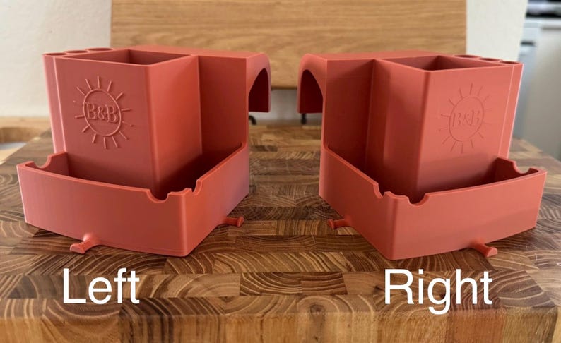 May include: Two terracotta-colored organizers with multiple compartments and a lower tray. Each organizer has the letters "B&B" inside a sunburst design. The word "Left" is below the left organizer, and "Right" is below the right organizer.