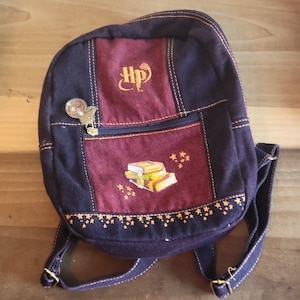 jansport backpack harry potter Loungefly Trilogy Triple Pocket MINI : Clothing, Shoes & Jewelry This mini 12 plush backpack features famous Harry Potter Hogwarts icons in a whimsical watercolor allover print and is perfect for carrying wallet Jansport Cross Town Plus Medium