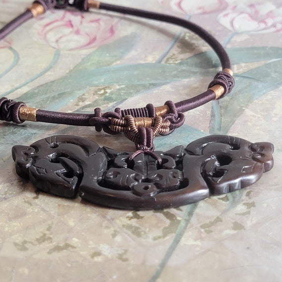 Vintage Carved Dyed Soapstone Horse Heads Pendant on a Brown Cord Jade Bead Closure View 3