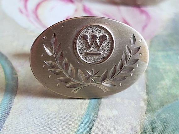 A SILVER ENGRAVED MONEY CLIP Christie's