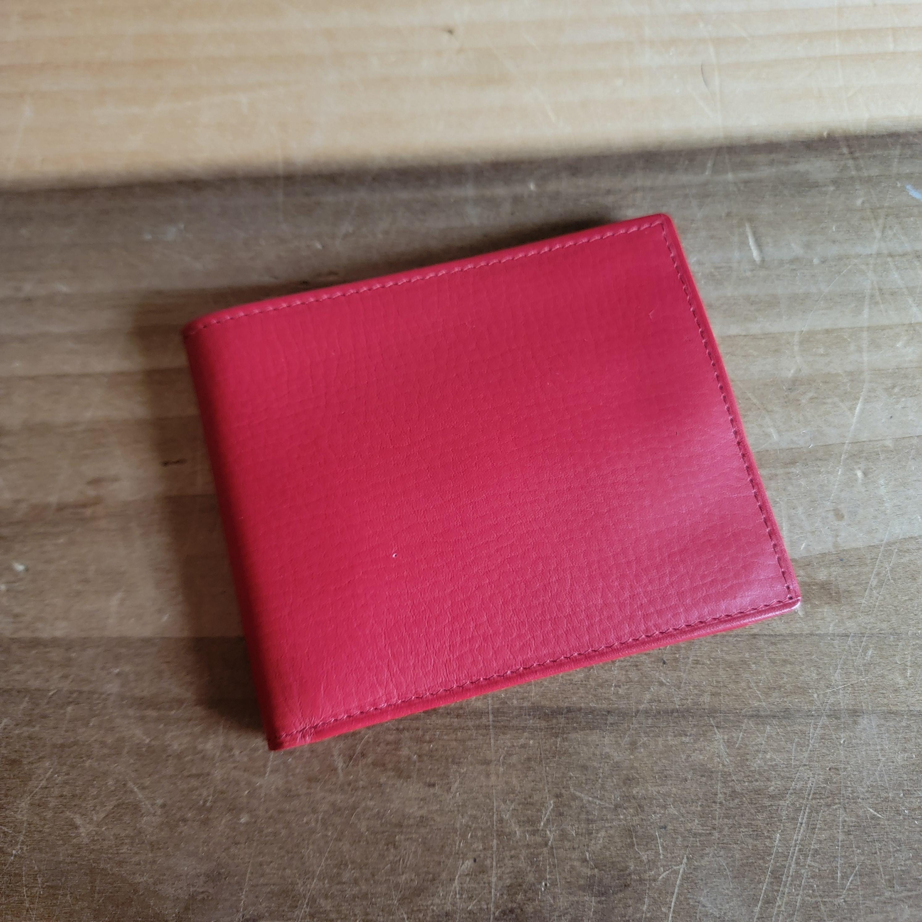 Vintage Montres Rolex S. A. Geneva Switzerland Red Leather Bifold