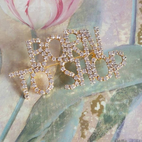 Vintage Born To Shop Brooch Pin Gold Tone Clear Rhinestones Faceted Word