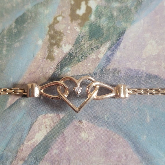 Vintage 14 Karat Gold and Tiny Diamond Heart Brac… - image 1