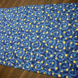 blue celestial with stars and swirls print cotton and solid blue cotton reversible table runner table decor table topper