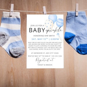 May include: Baby shower invitation with blue and white socks hanging on a clothesline. The invitation reads "Join us for a Baby Sprinkle" with details about the event, including the date, time, and location.
