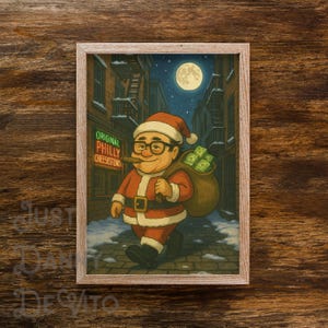 Peut inclure: Impression encadrée représentant un personnage de dessin animé vêtu en Père Noël, marchant dans une ruelle enneigée la nuit. Le personnage porte un sac d'argent et un cigare. L'impression comprend le texte "Original Philly Cheesesteaks".