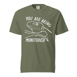 Grappig T-shirt monitorhagedis | Je wordt gevolgd V2