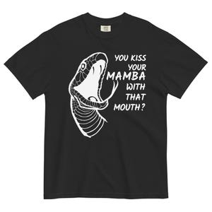 May include: Black t-shirt with a white graphic of a snake's open mouth and the text "YOU KISS YOUR MAMBA WITH THAT MOUTH?" in white. The shirt is made of a soft, comfortable material.