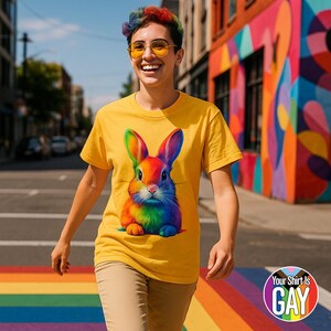 Hop Proud in a Rainbow Bunny T-Shirt That Bursts with LGBTQ+ Joy and Colorful Queer Energy for Pride Parades Spring Vibes and Everyday Slay