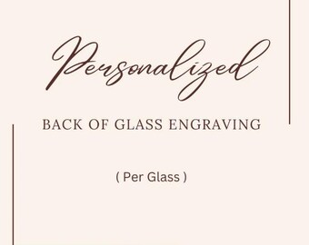 May include: A light pink square graphic featuring dark brown text that reads Personalized BACK OF GLASS ENGRAVING ( Per Glass ). The text is framed by two dark brown corner lines, one in the top right and one in the bottom left corner.