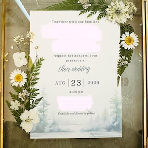 Wedding flower preservation pressed flower frame that uses a bridal bouquet with a wild flower theme.