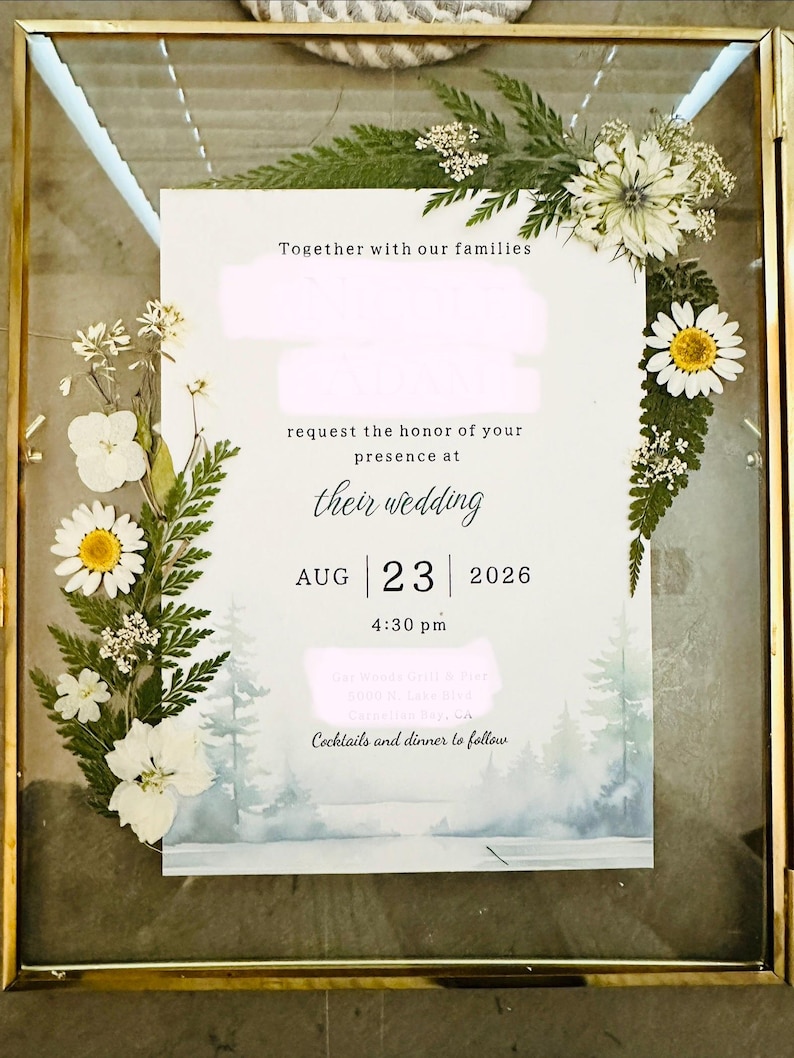 Wedding flower preservation pressed flower frame that uses a bridal bouquet with a wild flower theme.