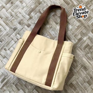 Sac bandoulière en toile pour femme – Fourre-tout grande capacité, multiples poches extérieures, sac à main zippé, sac étudiant, sac à provisions