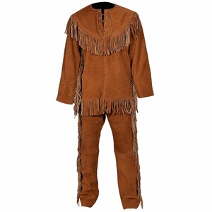 May include: A brown suede leather outfit consisting of a long-sleeved pullover shirt and matching trousers. The shirt features a lace-up neckline and long fringe detailing across the chest and hem. The trousers include long fringe along the side seams.