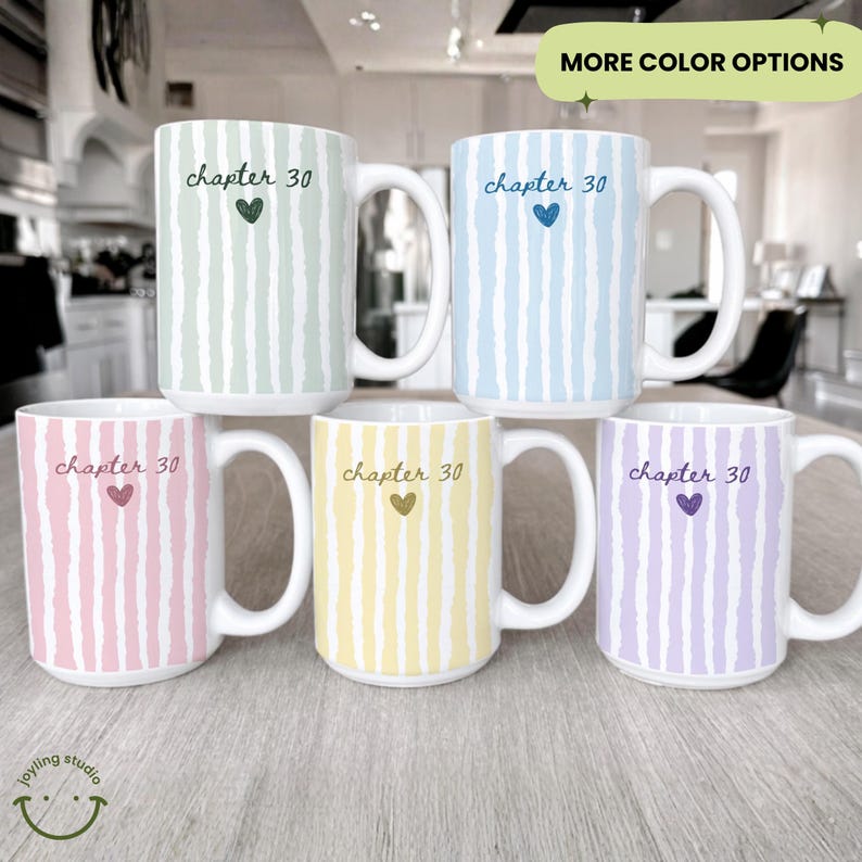 May include: Six ceramic mugs with white handles, each featuring a vertical striped pattern in pastel colors: green, blue, pink, yellow, and purple. The text "chapter 30" and a heart are printed on each mug. The phrase "MORE COLOR OPTIONS" is also visible.