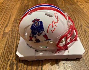 Pegatina con certificado de autenticidad del mini casco de los New England Patriots firmado por Tom Brady
