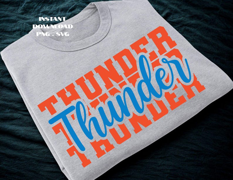 May include: A folded gray t-shirt with the word "THUNDER" in orange block letters and the word "Thunder" in blue cursive script. The shirt also has the text "INSTANT DOWNLOAD PNG . SVG".