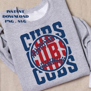 May include: A light grey crewneck sweatshirt featuring a dark blue graphic of the word CUBS repeated in a block font. A red baseball graphic with blue stitching is centred over the text. The text INSTANT DOWNLOAD PNG . SVG is visible.