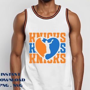 May include: White basketball jersey with orange and black trim. The front features a heart-shaped design with a basketball player silhouette in blue and orange, and the word "Knicks" in orange and blue.