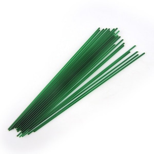 May include: A bundle of green floral wire stems. The wire is thin and flexible, making it ideal for crafting and floral arrangements.