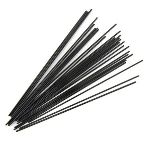 May include: A bundle of black metal spokes for bicycle wheels.