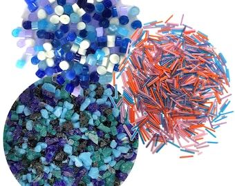 May include: Assortment of colorful glass beads in various shapes and sizes. The beads are blue, white, purple, orange, and pink. The beads are perfect for jewelry making, crafts, and home decor.