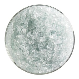 May include: A clear glass bowl filled with small, clear, and translucent crystals. The crystals are a light blue color and appear to be made of glass or quartz.