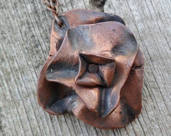 Handmade Oxidized Copper Flower Necklace: Rustic Pendant