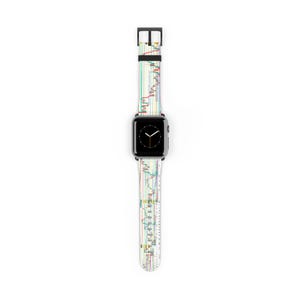 May include: Black smartwatch with a white band featuring a colorful, abstract design resembling a stock market chart. The band has a black buckle and a black watch face. The watch is displayed against a white background.