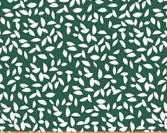 May include: A green fabric with a white leaf pattern. The fabric is measured with a ruler in inches.