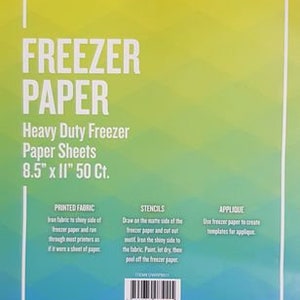May include: A package of 50 heavy duty freezer paper sheets, measuring 8.5 inches by 11 inches. The package is yellow and blue with the text "FREEZER PAPER" in white. The package also includes instructions for using the freezer paper for printed fabric, stencils, and applique.