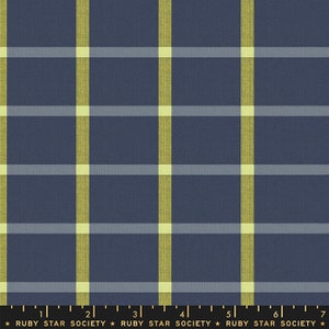 May include: A blue and yellow plaid fabric with a subtle texture. The fabric is woven with thin stripes of yellow and white, creating a checkered pattern.