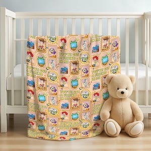 May include: A light orange blanket featuring a repeating pattern of Toy Story characters in rectangular and circular frames, including Woody, Buzz Lightyear, and Rex. The text "YOU'VE GOT A FRIEND IN ME" is printed in green throughout the design.