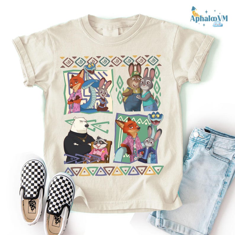a t-shirt with a colorful graphic of cartoon animal characters, including a bear, a rabbit, and other animals, arranged in a collage-like manner.