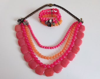 Fossil Brand Chunky Statement Necklace in pinks and peach with silver flower accents